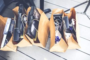 brown shopping bags filled with products