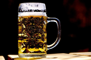 a glass mug full of beer